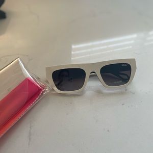 Quay sunglasses “dollar signs”